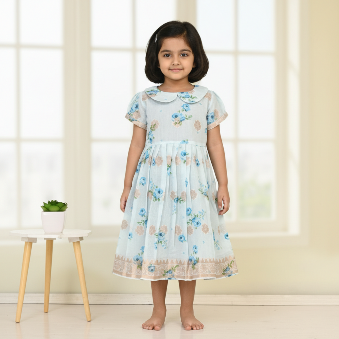 ICE BLUE CHANDARI WITH GOLDEN LUREX BODER AND FLOWER PRINTED